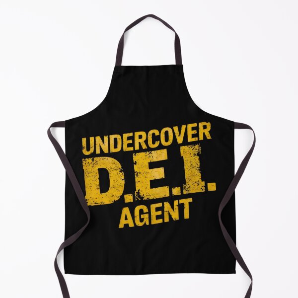 Item preview, UNDERCOVER DEI AGENT bold yellow text on black distressed design edgy striking t-shirt wear it proud stand out mystery intrigue designed and sold by Brian Hibbs.