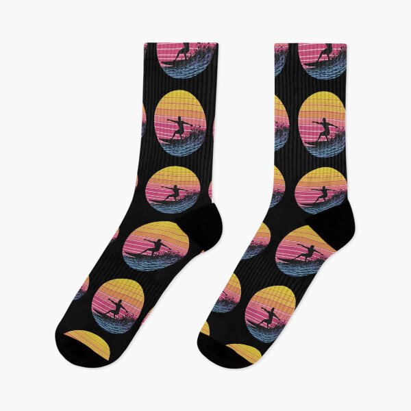 Item preview, Retro Sunset Surfer Riding Wave designed and sold by TeeARTHY.