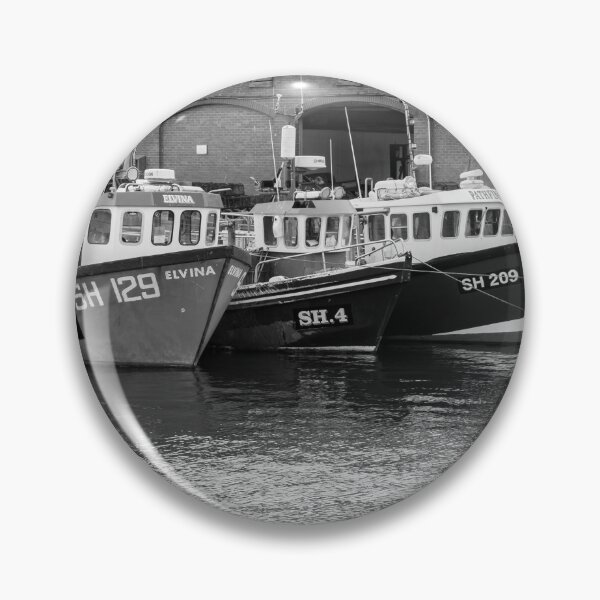 Item preview, Fishing boats moored outside Scarborough fish market in black and white designed and sold by yackers1.