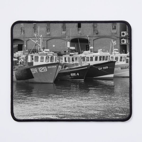 Item preview, Fishing boats moored outside Scarborough fish market in black and white designed and sold by yackers1.