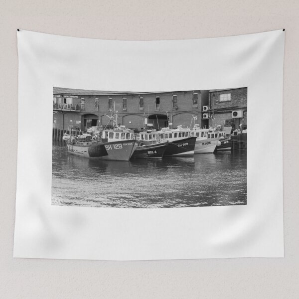 Item preview, Fishing boats moored outside Scarborough fish market in black and white designed and sold by yackers1.