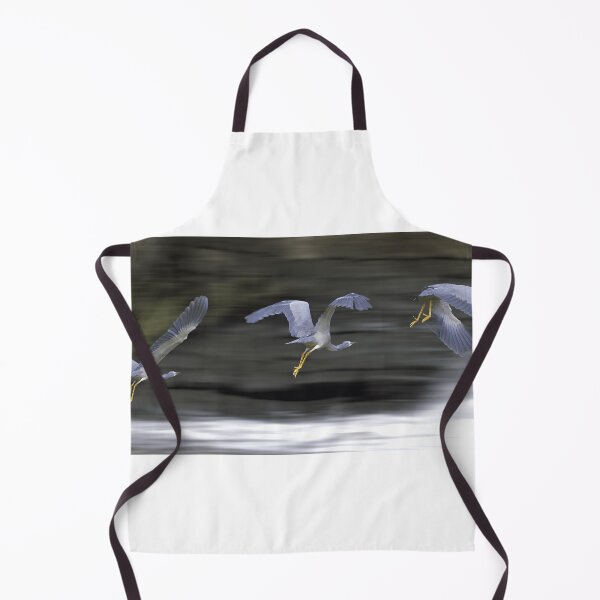 Item preview, A White Faced Herons flying over the flooding weir designed and sold by PixSL Photography and Photo Art.