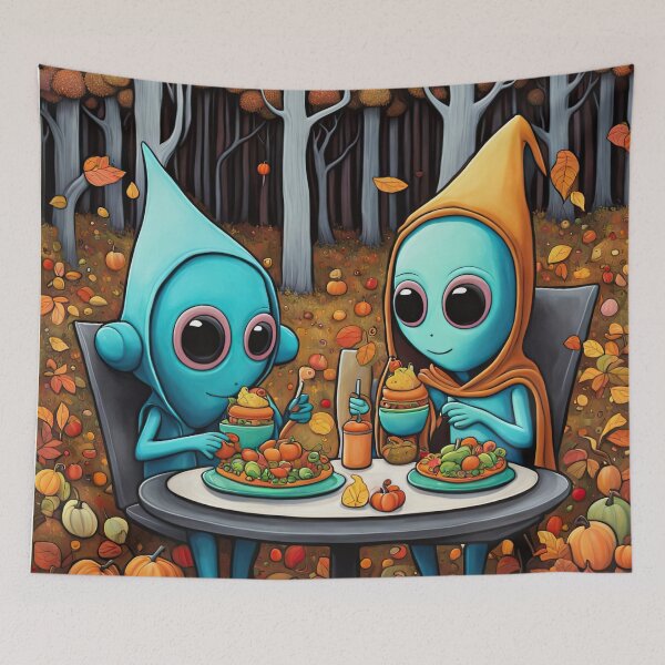 Item preview, Two Alien's wearing Hoodies having a romantic dinner on in the middle of a forest during autumn designed and sold by Colin Bentham.