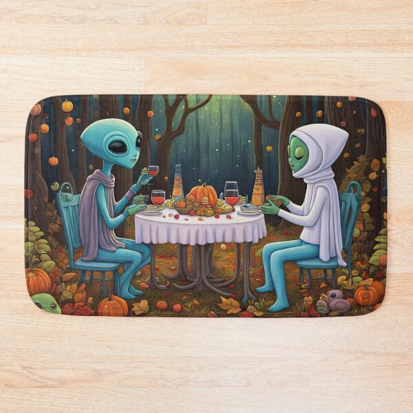 Item preview, Two Alien's wearing Hoodies having a romantic dinner on in the middle of a forest during autumn designed and sold by Colin Bentham.