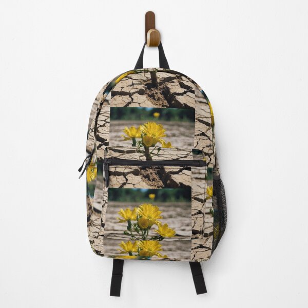 Item preview, Resilient Yellow Flowers in Cracked Earth designed and sold by KilianSzmid.