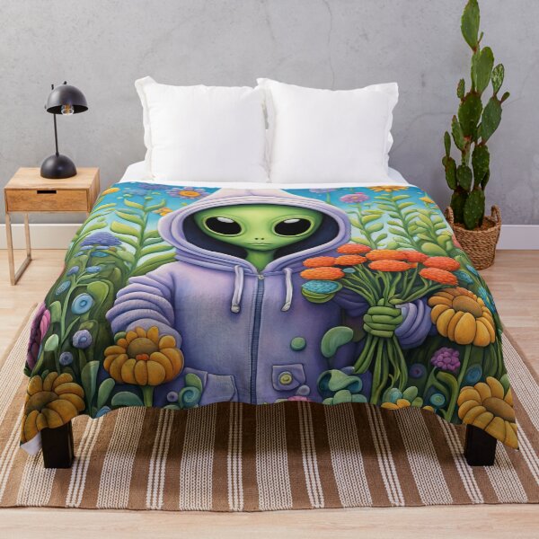 Item preview, Alien wearing a hoodie Planting Flowers designed and sold by Colin Bentham.