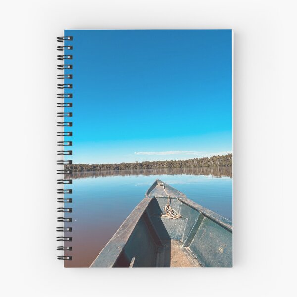 Item preview, Canoe in Lake Sandoval under the clear blue sky.  designed and sold by ninjapineapple.