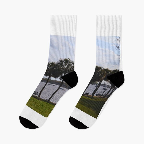 Item preview, Serene Riverside with Palm Trees designed and sold by Phakade's Photos.