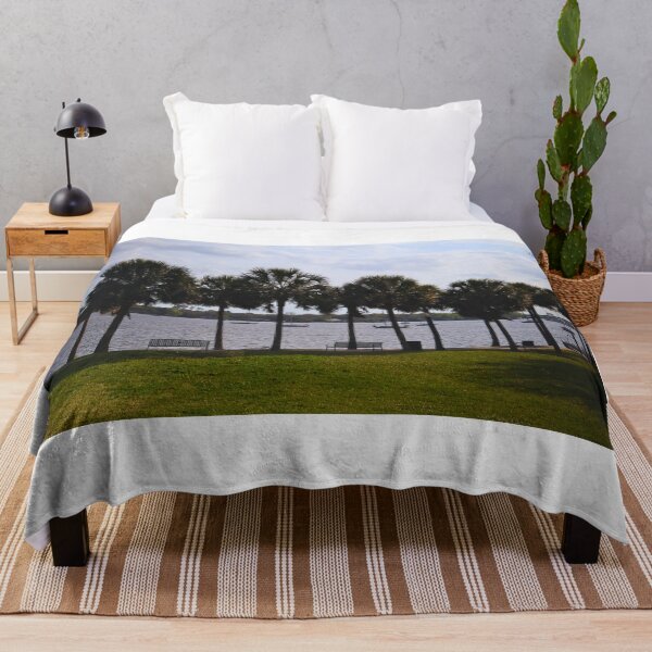 Item preview, Serene Riverside with Palm Trees designed and sold by Phakade's Photos.