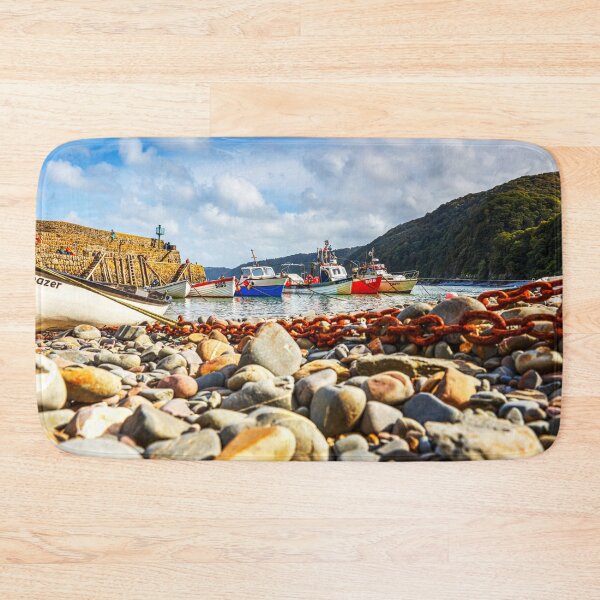 Item preview, Clovelly, Devon, Colorful Boats in Tranquil Harbor designed and sold by Paul Thompson Photography.