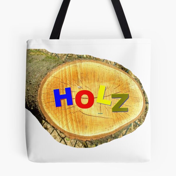 Item preview, Tree disc with the word HOLZ in colour designed and sold by ZoffArt-Shop.