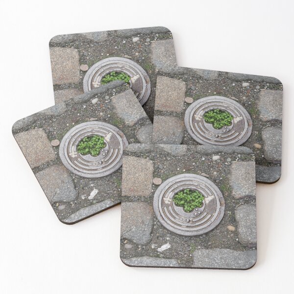 Item preview, Urban Nature – Green Plant Growing Through Manhole in Cobblestone Street designed and sold by RastislavS.