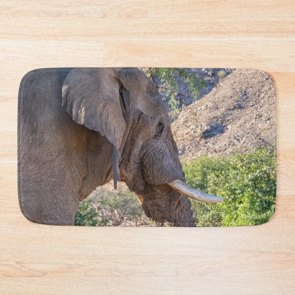 Item preview,  African Savanna elephant eating in Etosha National Park designed and sold by Photopat.
