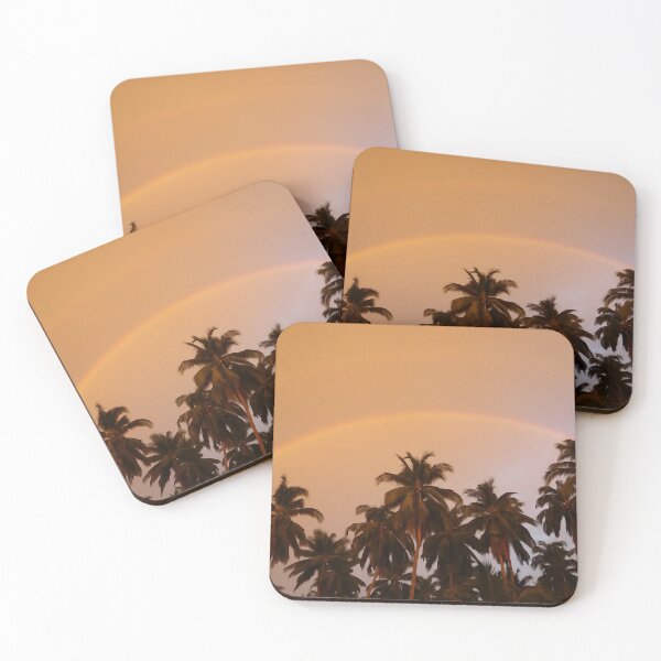 Item preview, A beautiful rainbow streaks across the bright orange evening sky and coconut groves. designed and sold by KinImageCraft.