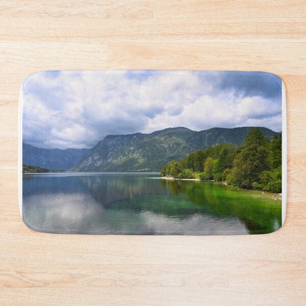 Item preview, Bohinj Lake, Slovenia. Landscape of the lake with green water and mountains in background designed and sold by goceris.