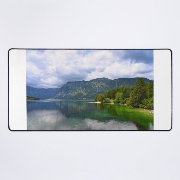 Item preview, Bohinj Lake, Slovenia. Landscape of the lake with green water and mountains in background designed and sold by goceris.