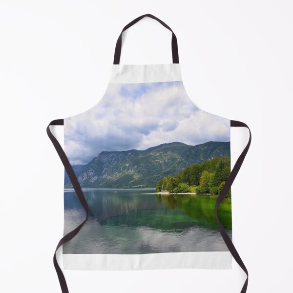 Item preview, Bohinj Lake, Slovenia. Landscape of the lake with green water and mountains in background designed and sold by goceris.