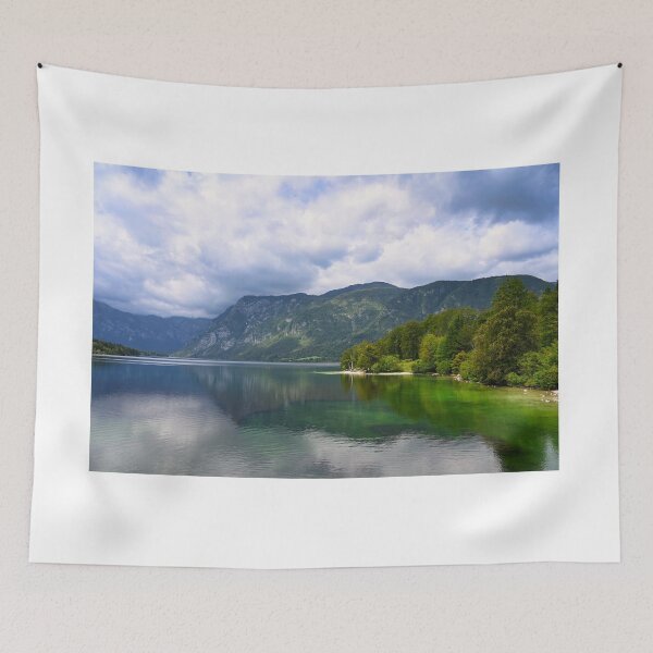 Item preview, Bohinj Lake, Slovenia. Landscape of the lake with green water and mountains in background designed and sold by goceris.
