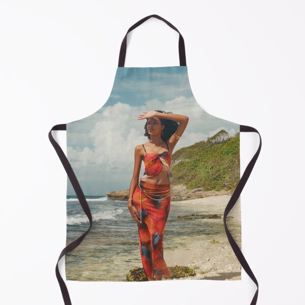 Item preview, Caribbean Woman in Red Sarong by the Ocean – Tropical Beach Photography Print designed and sold by TedKentPhoto.