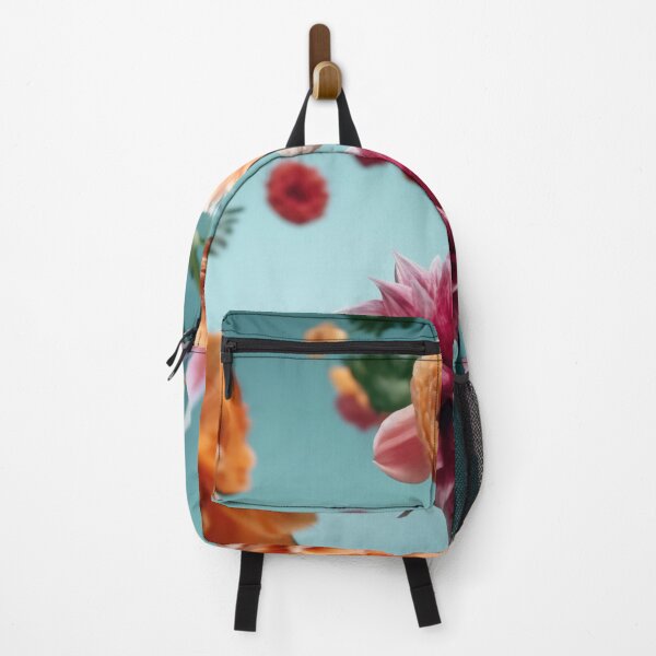 Item preview, Beautiful spring flowers flying in the air, against teal background. Creative spring floral layout. Minimal birthday, valentines or wedding concept designed and sold by anytka.