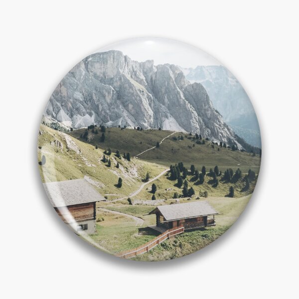 Item preview, Dolomites, Italy I Picturesque wooden chalets in the green Seceda mountains of an Alps landscape between lush green meadows, fir forests and pastel blue summer skies of preserved peaceful nature designed and sold by Julie Travel Photography.