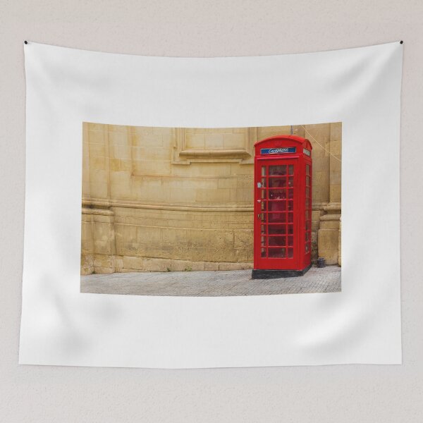 Item preview, Classic Red Telephone Booth Against Historic Stone Wall designed and sold by Nmallia.