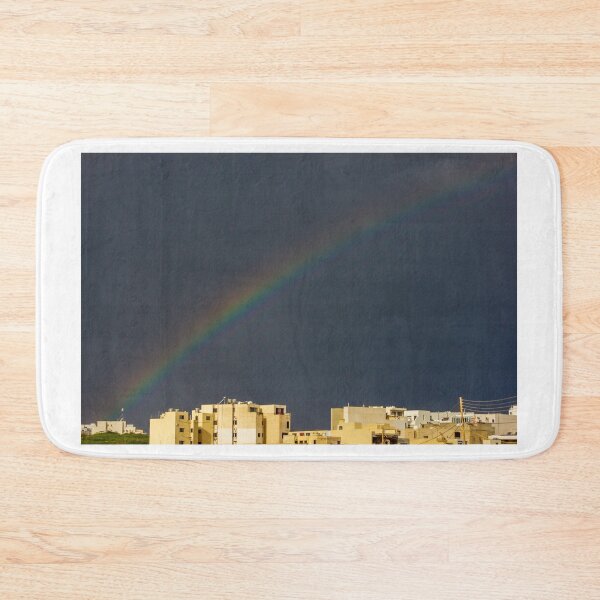 Item preview, Rainbow Arching Over Urban Settlement Against Dark Sky designed and sold by Nmallia.
