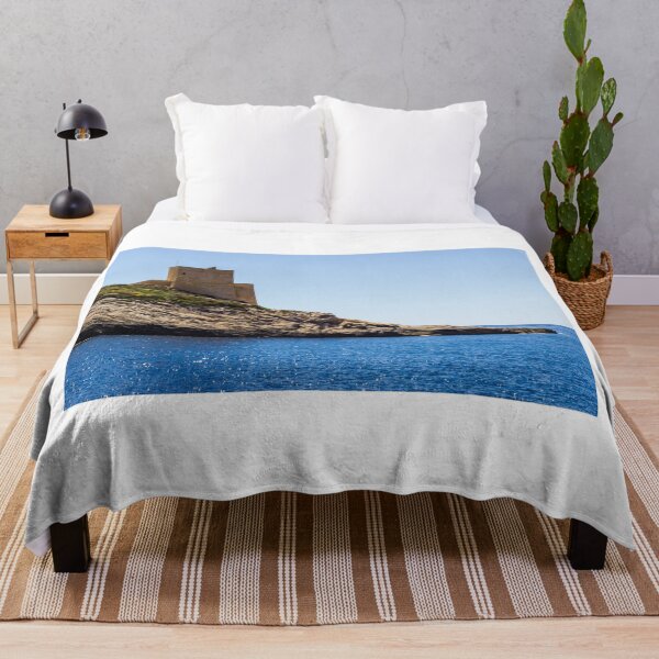 Item preview, Seaside Stone Tower on a Rocky Cliff Overlooking Blue Ocean Waters designed and sold by Nmallia.