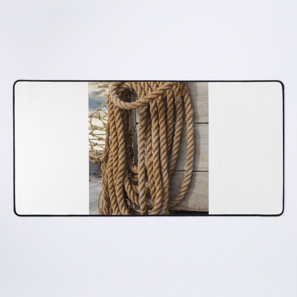Item preview, Close-Up of Coiled Rope on Wooden Box in Nautical Setting designed and sold by Nmallia.