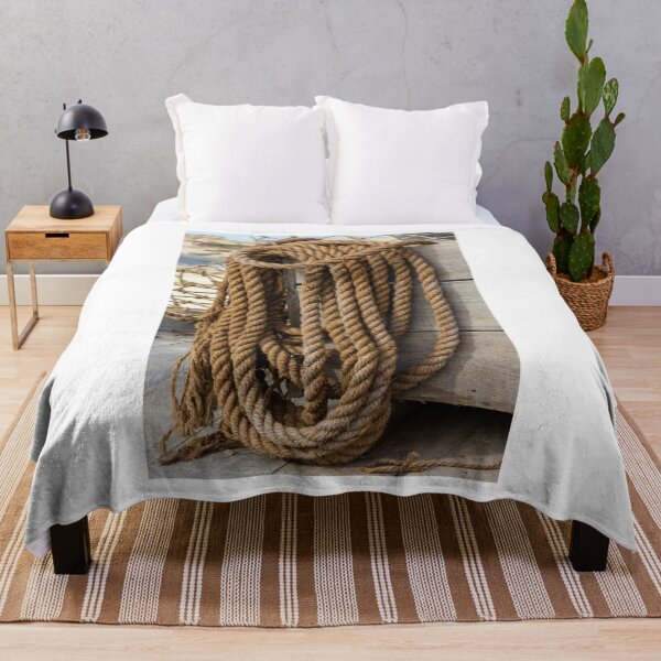 Item preview, Close-Up of Coiled Rope on Wooden Box in Nautical Setting designed and sold by Nmallia.