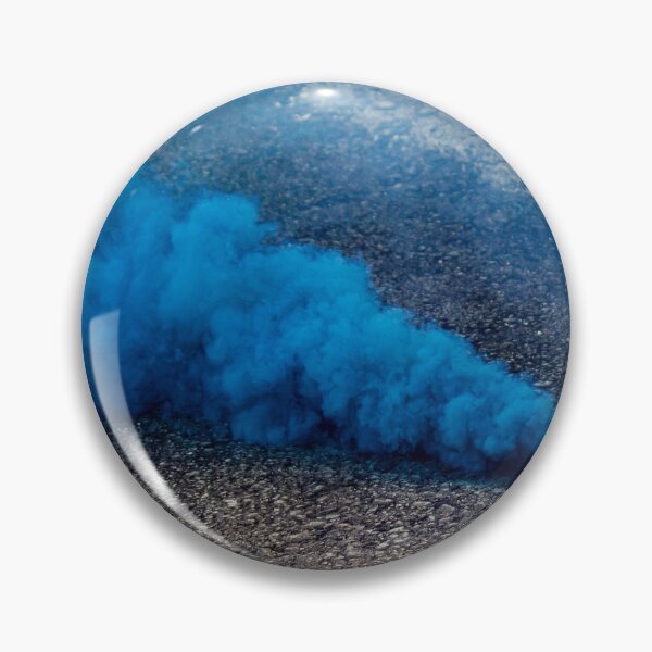 Item preview, Blue Smoke Bomb Releasing Vibrant Smoke on Outdoor Pavement Surface designed and sold by Nmallia.