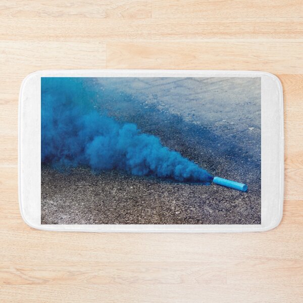 Item preview, Blue Smoke Bomb Releasing Vibrant Smoke on Outdoor Pavement Surface designed and sold by Nmallia.