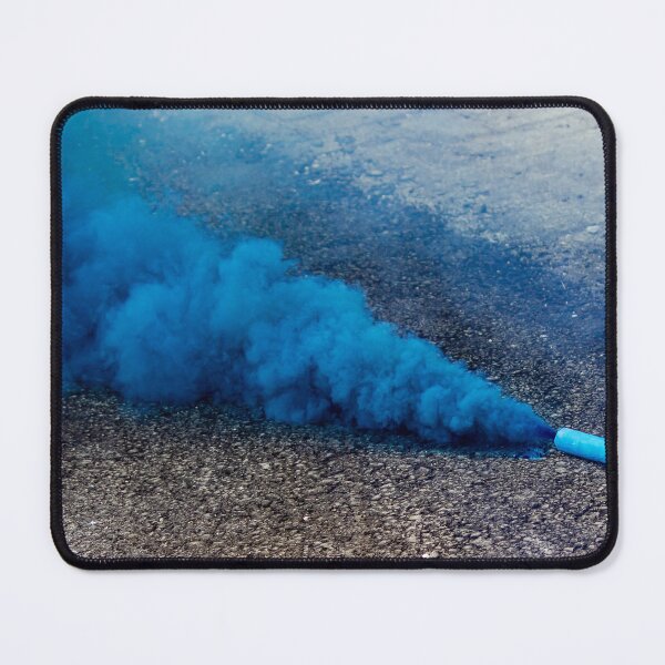 Item preview, Blue Smoke Bomb Releasing Vibrant Smoke on Outdoor Pavement Surface designed and sold by Nmallia.