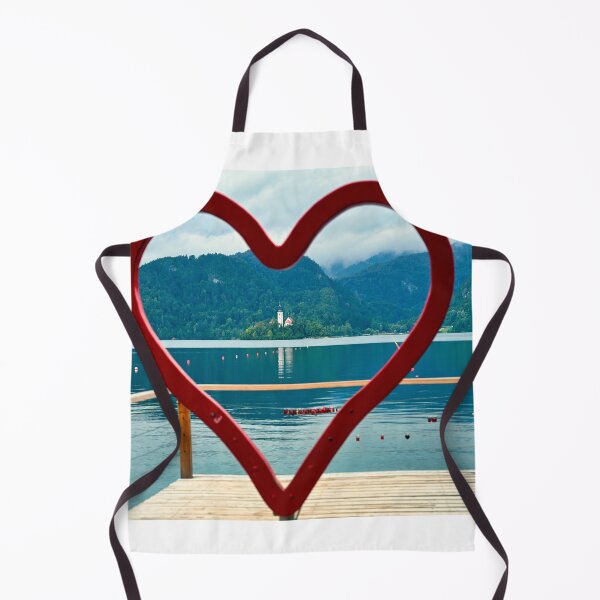 Item preview, View of the Pilgrimage Church of the Assumption of Maria Lake Bled through heart shape, Slovenia designed and sold by goceris.