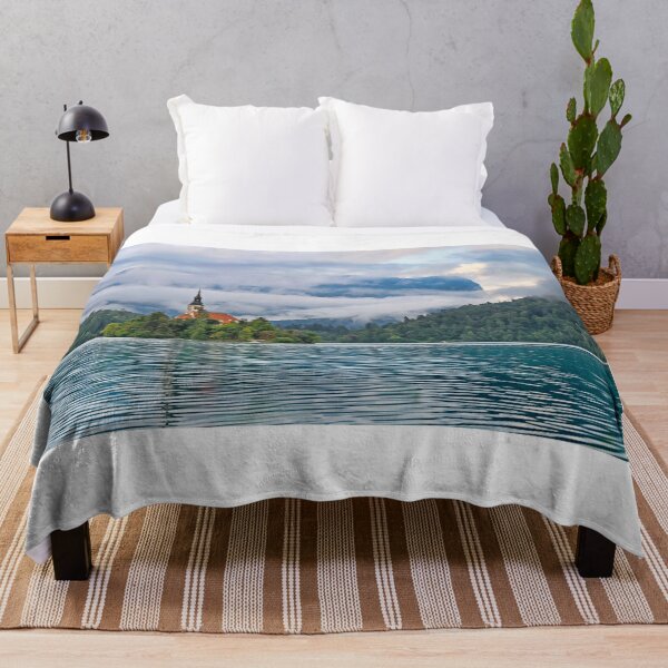 Item preview, Pilgrimage Church of the Assumption of Maria in the morning,clouds over mountains landscape,Lake Bled, Slovenia designed and sold by goceris.