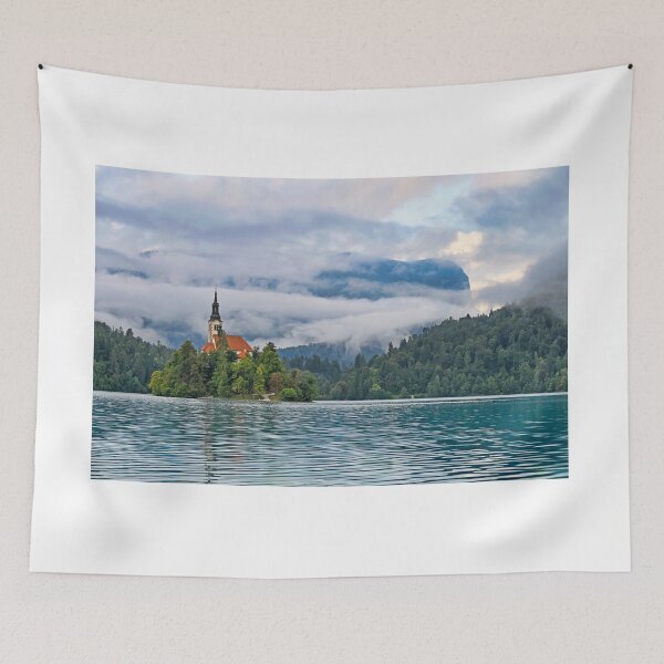 Item preview, Pilgrimage Church of the Assumption of Maria in the morning,clouds over mountains landscape,Lake Bled, Slovenia designed and sold by goceris.