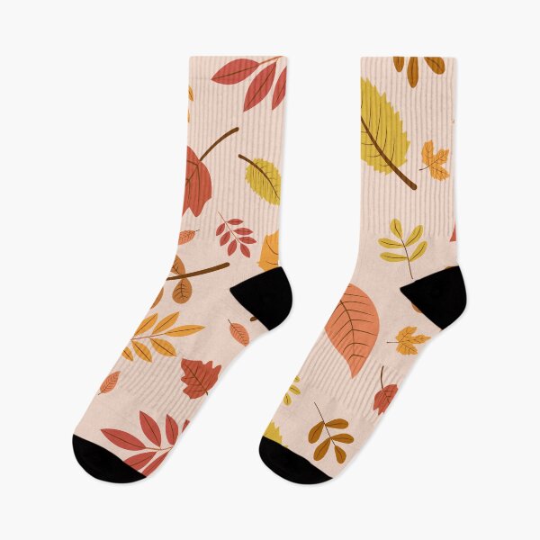 Item preview, Warm Autumn Falling Leaves on Blush Pink Pattern Graphic T-Shirt designed and sold by FestivityFinds.