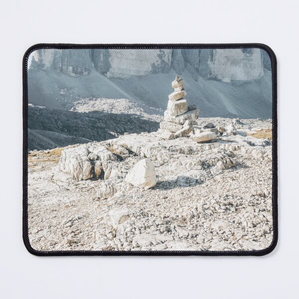 Item preview, Dolomites, Italy I Tre Cime di Lavaredo mountain landscape with cairn in foreground and rocky peaks the authentic, geometric, raw mineral wilderness nature of the Italian Alps during summer designed and sold by Julie Travel Photography.