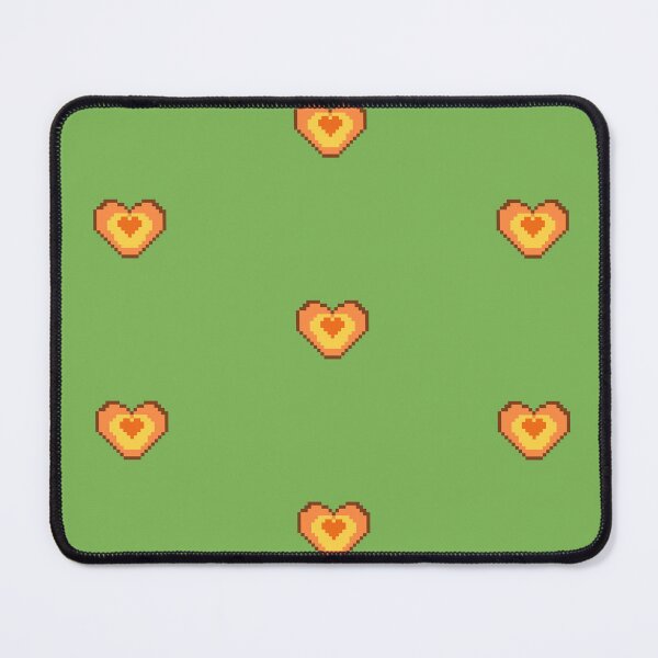 Item preview, Halloween heart in brown orange and yellow pumpkin colors and pixel art style designed and sold by CraftMuse19.