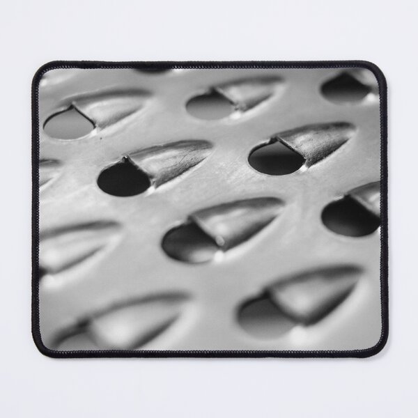 Item preview, Close-Up Macro View of a Stainless Steel Grater in Black and White designed and sold by Nmallia.