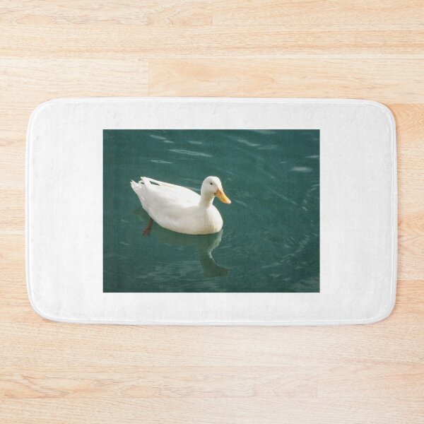 Item preview, White Duck Gliding on Calm Blue Water in a Serene Outdoor Scene designed and sold by Nmallia.