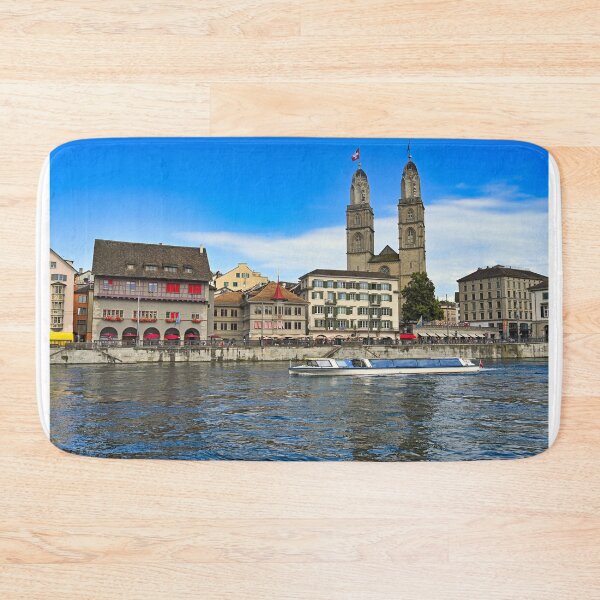 Item preview, Zurich city center with famous Grossmunster churh and a tourist boat sails on the river Limmat, Switzerland designed and sold by goceris.