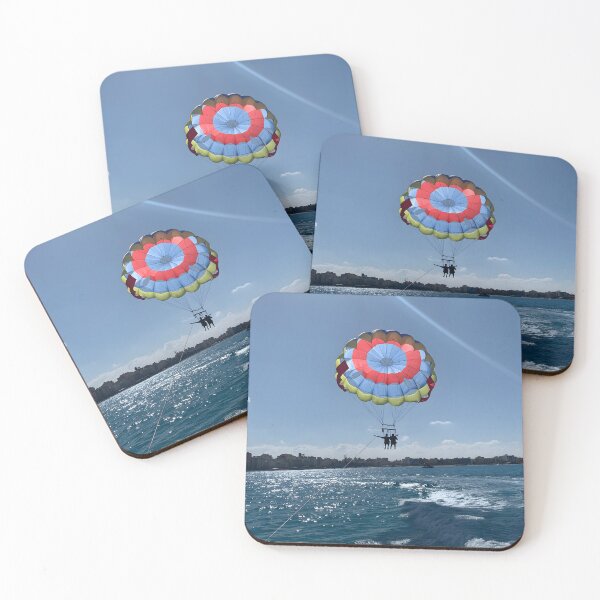 Item preview, Colorful Parasailing Adventure over Blue Sea and City Skyline designed and sold by Torizo.