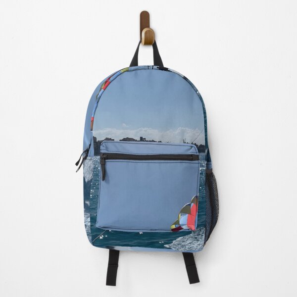 Item preview, Colorful Parasailing Adventure over Blue Sea and City Skyline designed and sold by Torizo.