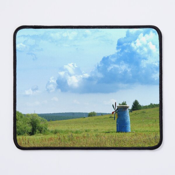 Item preview, Vibrant Blue Windmill in a Serene Countryside Meadow - Whimsical Landscape Photography designed and sold by Luminari Creations.