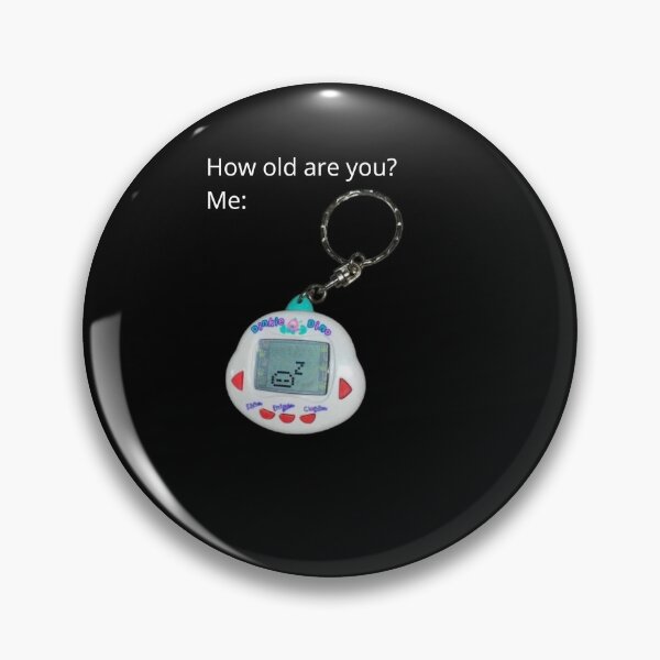Item preview, How Old Are You? Dinkie Dino Retro Virtual Pet Meme designed and sold by GEEK_out.