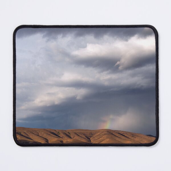 Item preview, Rainbow with diagonal clouds over mountains designed and sold by lisavonbiela.