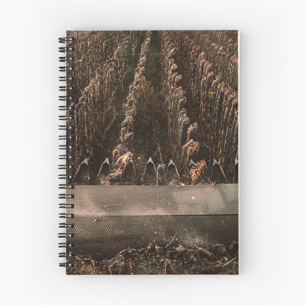Item preview, An atmospheric photo in an apocalyptic style, harvesting sunflowers, view from the cab of a combine harvester. designed and sold by RinaZik.