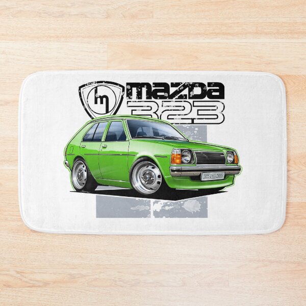 Artikelvorschau, Mazda 323 RWD Grüne Fließheck-Illustration entworfen und verkauft von Petrolhead T-Shirts and Art.