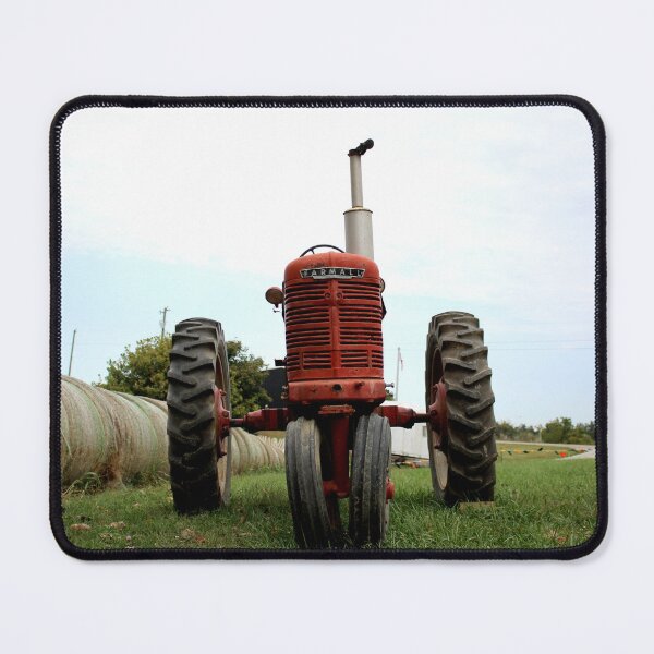 Item preview, Orange tractor designed and sold by McFleur's Lens.